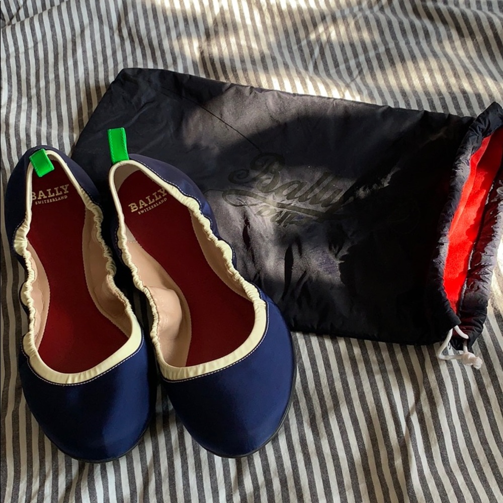 Navy blue Bally flats with travel pouch